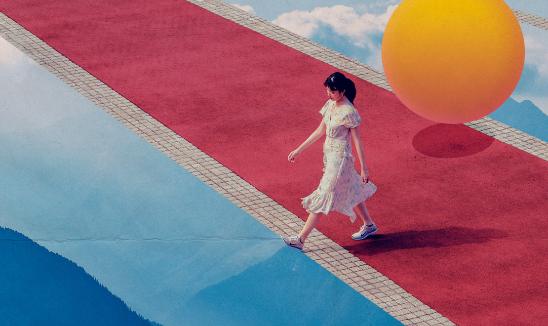 Girl walking yellow ball